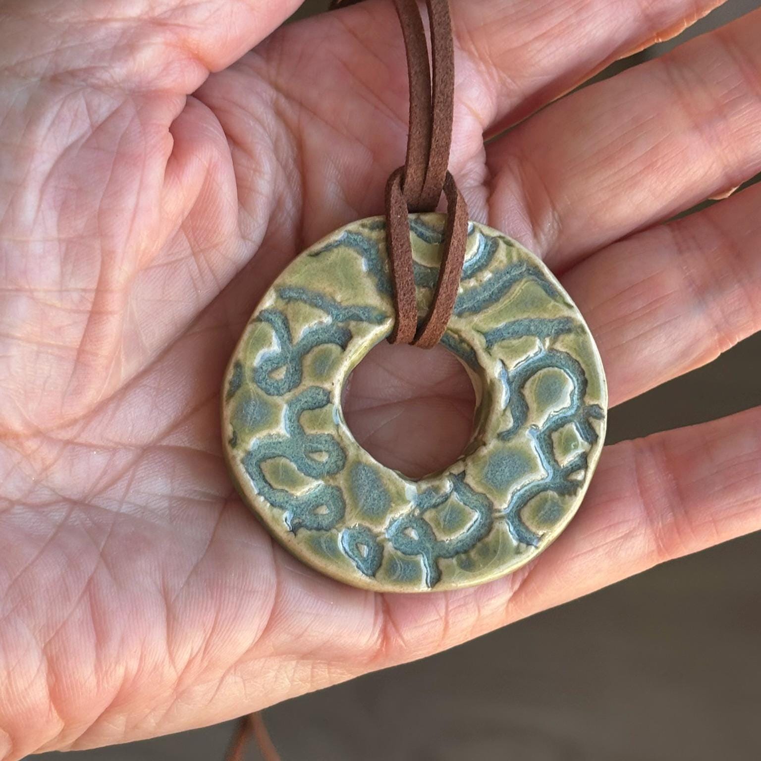 Green Ceramic Ring Necklace: Handmade Stoneware Pendant, Brown Suede Cord - Vakili Art