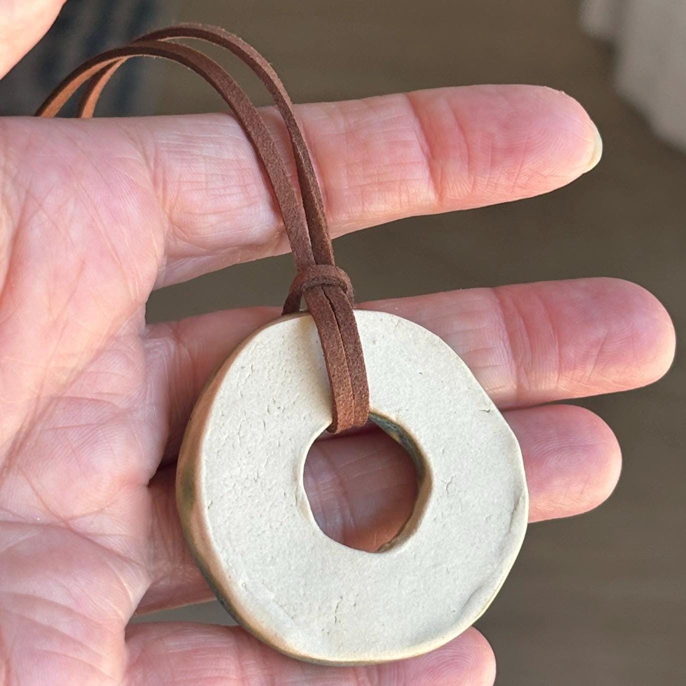 Green Ceramic Ring Necklace: Handmade Stoneware Pendant, Brown Suede Cord - Vakili Art