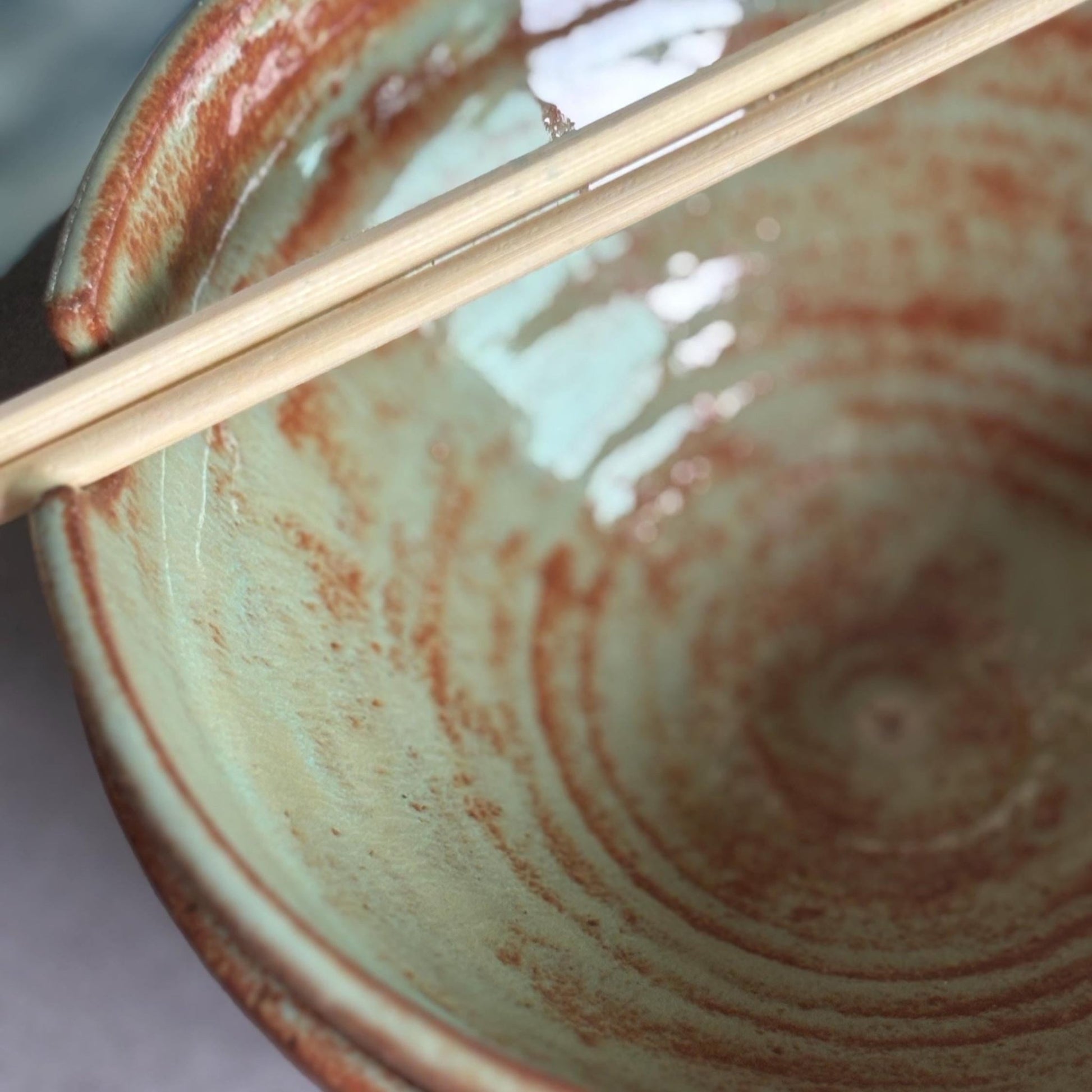 Handmade Ramen Bowl with Chopstick Rest Cutouts | Green and Rust Shino Ceramic Pottery Bowl - Vakili Art