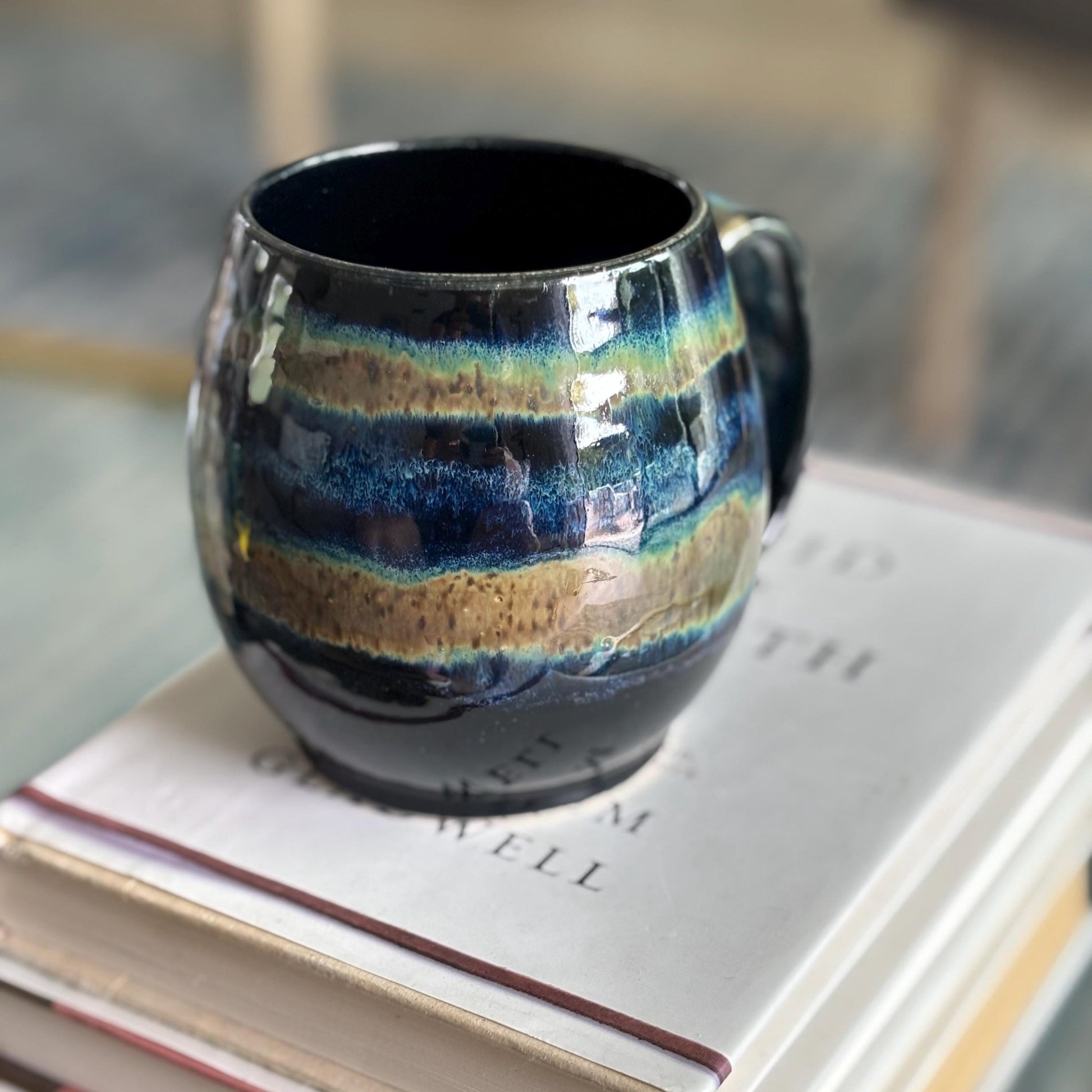 Rustic Handmade Stoneware Mug: Black, Blue & Green Spotty Glaze - Vakili Art